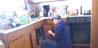 “If you want to change the world, become a plumber” Plumber at work min