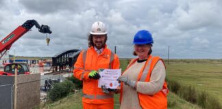 Network Rail and Natural Resource Wales’ partnership ‘on track’ to securing a greener future, combating climate change and improving rail links for passengers Certificate with crane background min scaled
