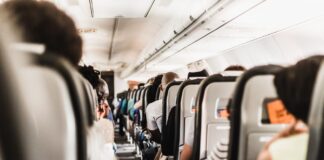 How to achieve a glowing in-flight beauty routine: Elevate Your Skincare at 30,000ft according to the experts! gerrie van der walt uOc3ldMSAiY unsplash min