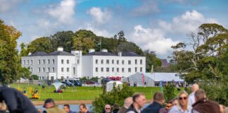 Visitors resting their legs and enjoying the sunshine at The GWCT Welsh Game Fair at Vaynol Hall min scaled