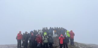 Ashmole & Co staff swap calculators for walking boots to help raise funds for the DPJ Foundation mental health charity Ashmole Co staff at the top of Pen y Fan sponsored walk min scaled