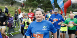 Mae Elusen GIG Leol yn cynnig lleoedd am ddim i gefnogwyr yn Hanner Marathon Llanelli Avril Powell scaled