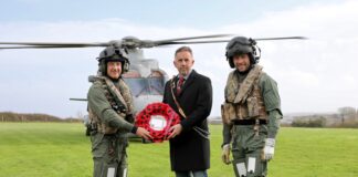 Royal Navy helicopter swoops in as Great Western Railway and The Veterans Charity join forces for latest Poppies to Paddington operation Poppies to Paddington RNAS scaled