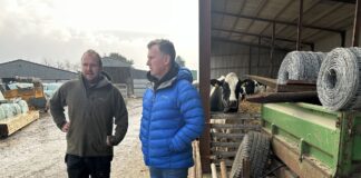 World renowned rugby ref Nigel Owens is supporting Welsh dairy farmers SCC farmer member Sion Hughes showing Nigel Owens around his farm in Criccieth low res