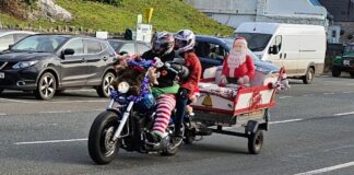 Taith teganau Nadolig Grŵp Beiciau Modur yn codi £4,000 i Elusen GIG Toy run 1 min