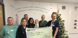 Family raises over £500 for Special Care Baby Unit Faith Meek Wilson cheque presentation scaled