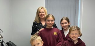 Ashmole & Co help fund the accountants of the future with donation to Llandybie Primary School Ysgol Llandybie pupils visiting Ammanford Ashmole Co office