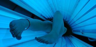 Fears record number of people in Wales risking their health using sunbeds. 640px Tanning bed in use