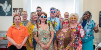 Men and women of Harlech bring flower power to residents of Pwll care home RM 130824 Harlech Pwll 009 scaled