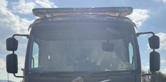 Y Diffoddwr Tân Mel Herbert yn Cwblhau Hanner Marathon Mewn Cit Diffodd Tân Llawn Race 04 scaled