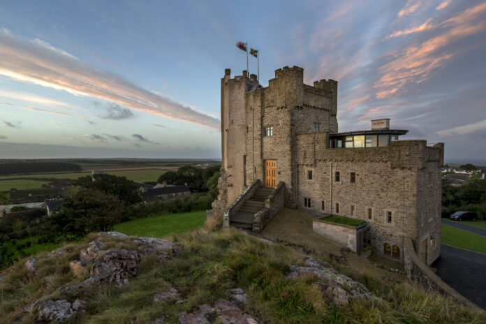 Roch Castle Pink Skies over St Brides Bay scaled