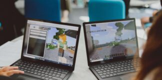 Disgyblion Cymru i brofi byd Minecraft Education a llunio dyfodol ynni gwynt ar y môr trwy gyfrwng cynlluniau gwersi newydd Students Playing Minecraft scaled
