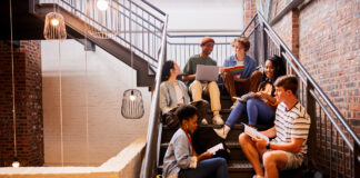 Lack of construction careers advice in Wales threatens housing targets Students on stairs 2