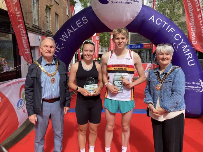 Overall male and female Ifan Bowen and Ella Barnwell Overall male and female Ifan Bowen and Ella Barnwell