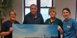 Photographer donates £1,500 and an acrylic print to Llanelli chemotherapy unit Byron Williams