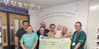 Parents raise £2,500 for Carmarthenshire Special Care Baby Unit Nicole and Rhys Harries SCBU presentation