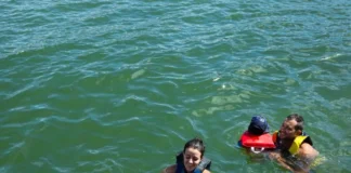 Make A Splash This Summer: Llandegfedd Lake Launches Action-Packed Activities Llandegfedd Lake Open Water Splash (stock image)