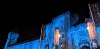 Iconic buildings across Wales light up blue in support of World Arthritis Day Cardiff castle