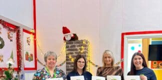 Dawns elusennol yn codi dros £8k i ward blant Bronglais Angharad Ward staff celebrate their fundraising