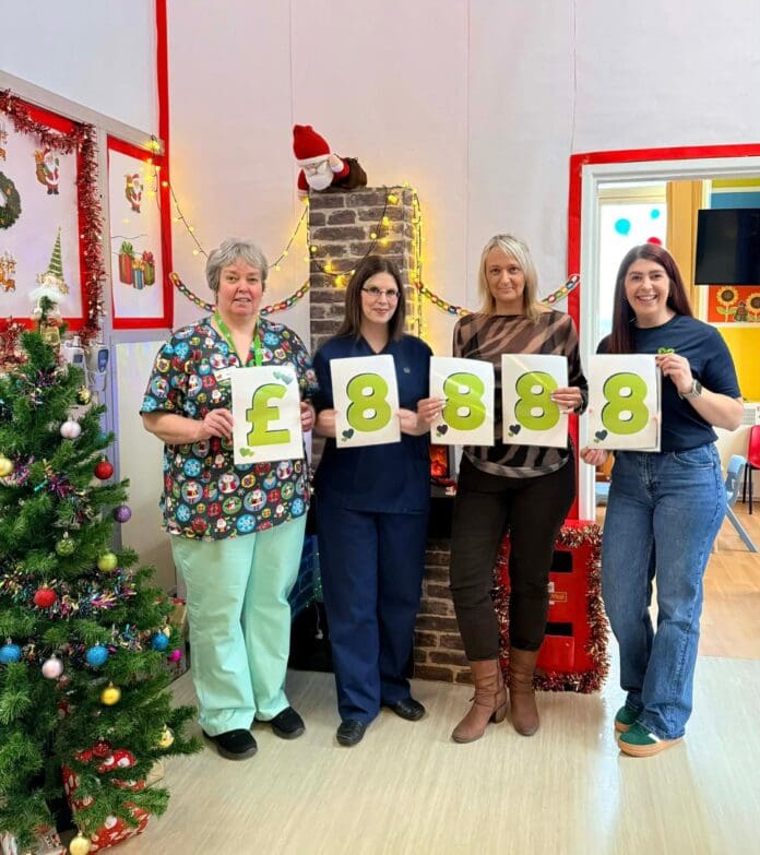 Angharad Ward staff celebrate their fundraising