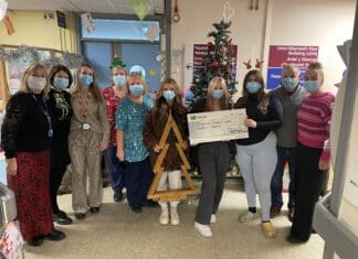 Children and young people from Carmarthenshire raise £630 for children’s ward Carmarthenshire Youth Service Presentation Photo