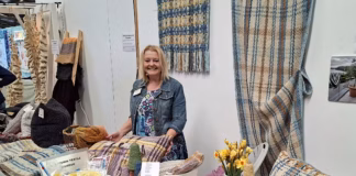 Bursary winners’ product stories capture an audience at Wonderwool Wales Emma on her stand