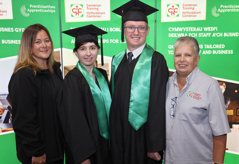 Apprentices achieve career success through Supported Apprenticeships Amber and Morgan with trainers