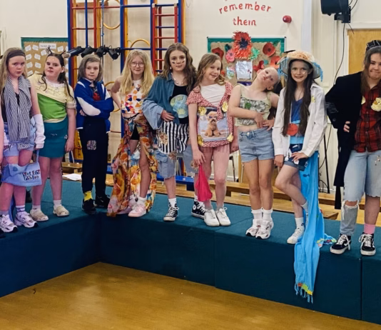 Creative Pupils Champion Sustainability At Libanus Primary School ‘Trashion Show’ Models at Libanus Trashion Show 2