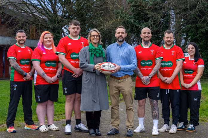 Specsavers audiologist Kyle James centre right with Wales Deaf Rugby chair Siân Elin Melbourne c