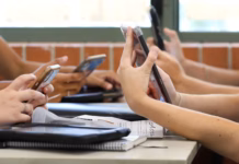 Cabinet to consider school mobile phone restrictions AdobeStock 390249107