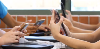 Cabinet to consider school mobile phone restrictions AdobeStock 390249107