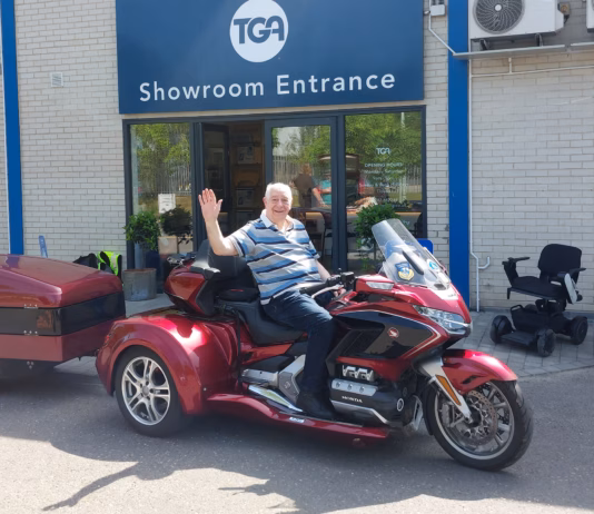 Disabled Pembrokeshire biker Max keeps riding with wheelchair in tow TGA Max Jones