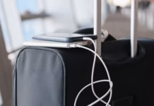 One Last Summer Getaway? Don’t Get Caught Out At Check-In! Phones with lithium batteries on a suitcase cropped